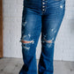 Gabriella Mid Rise Distressed Button Fly Flare Jeans